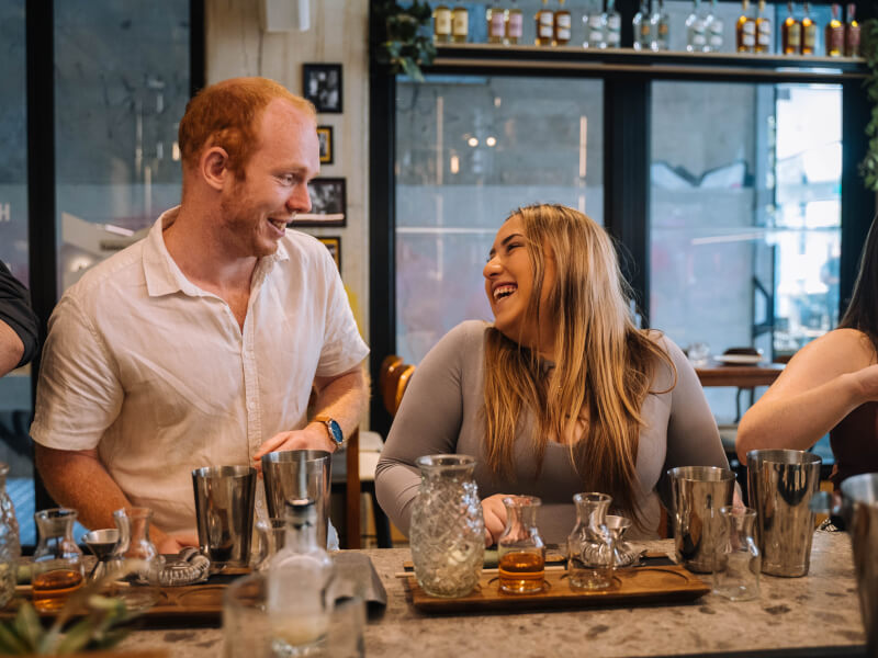 People having fun at a cocktail class